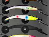 Close-up of FishMore T3 Pro Tackle Box fitting Reef Runner RR800 lures in Plano 3700 size